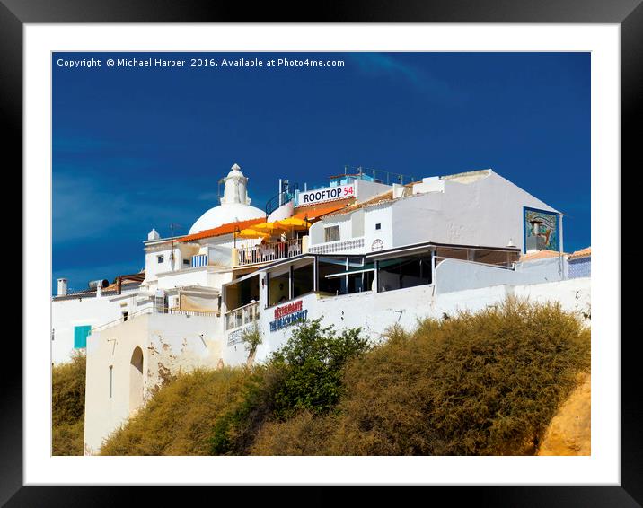 Cliff top restaurant in Albuferia, Algarve, Portug Framed Mounted Print by Michael Harper