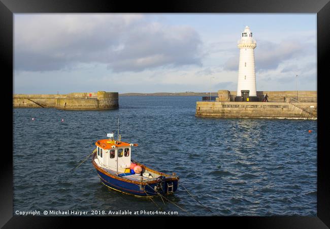 The lighthouse at Donaghadee Harbour Framed Print by Michael Harper
