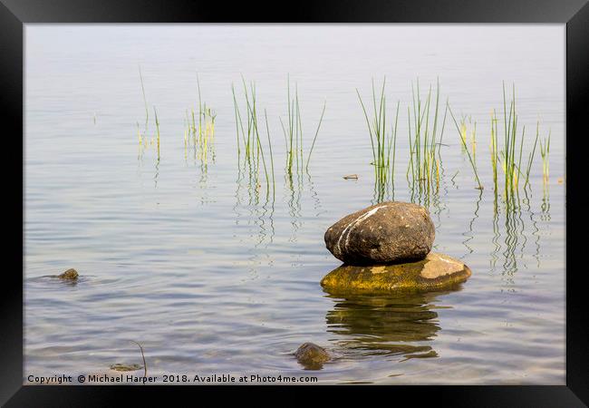 Rocks in the shallows in the Sea of Galilee  Framed Print by Michael Harper