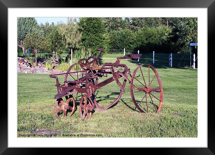 Plow Framed Mounted Print by Larry Stolle