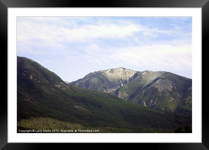 The Rocky Mountains Framed Mounted Print by Larry Stolle