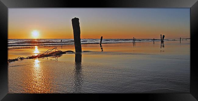  Posts at Sunrise Framed Print by Eric Watson