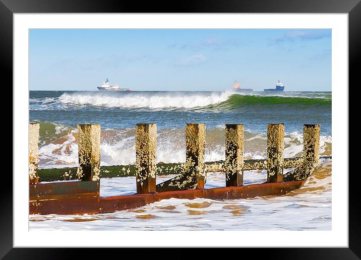 Against The Waves Framed Mounted Print by Bill Buchan