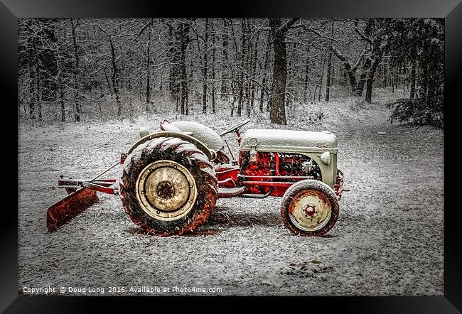 Tractor in the Snow Framed Print by Doug Long