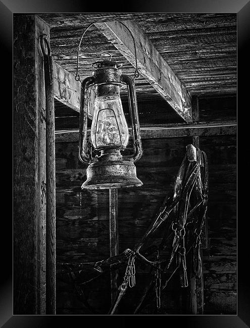 Lantern in the Barn Framed Print by Dennis Hirning