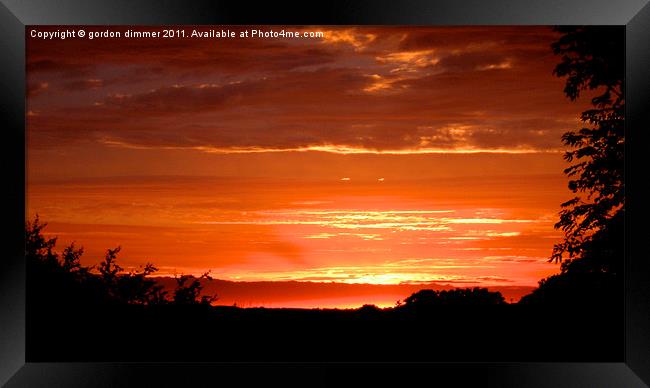 Sunset over Devon Framed Print by Gordon Dimmer