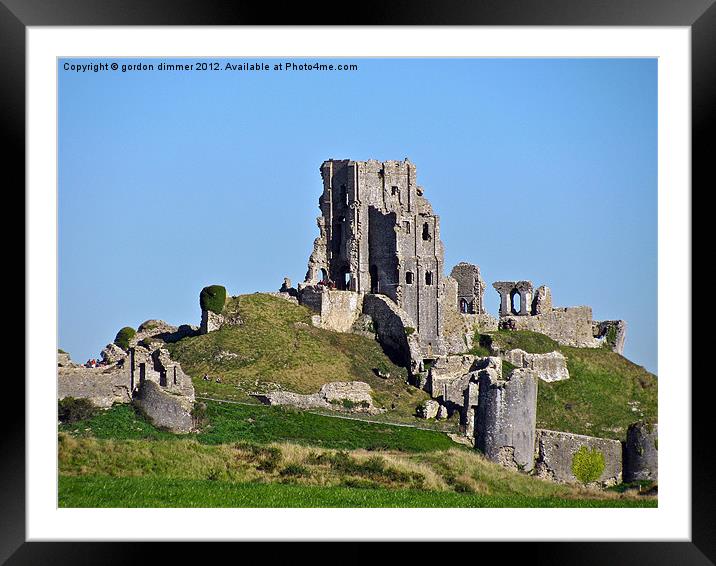 Corfe Castle on the skyline Framed Mounted Print by Gordon Dimmer