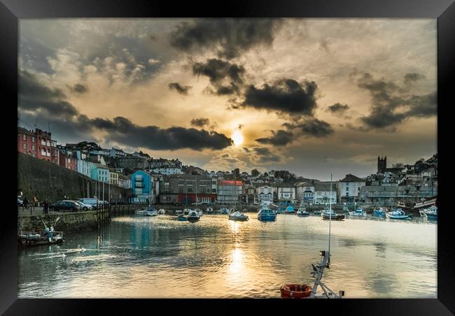 Brixham Harbour with a Setting Sun Framed Print by Gordon Dimmer