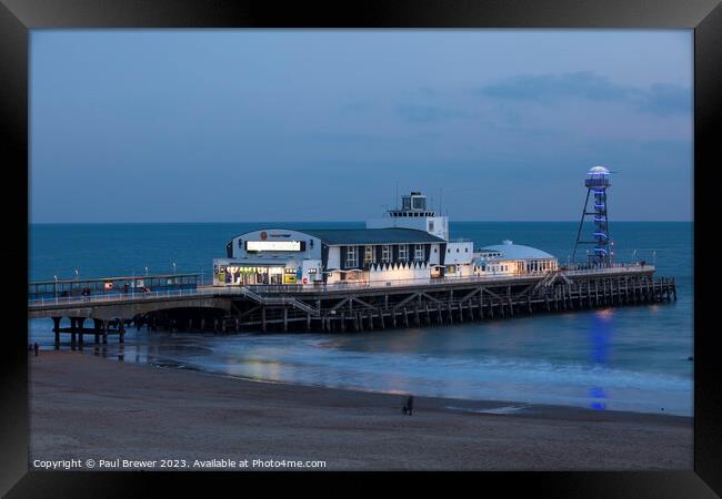Bournemouth Pier at night Framed Print by Paul Brewer