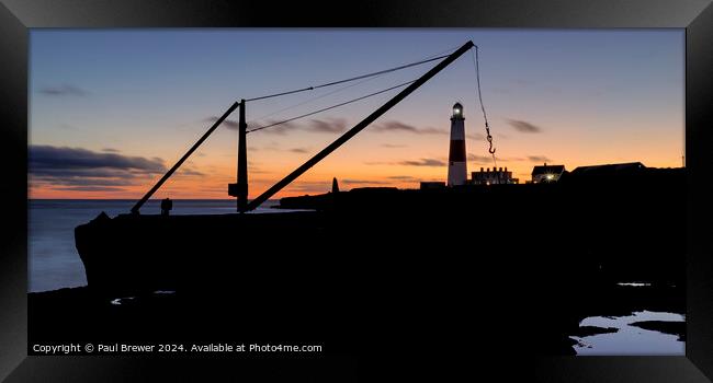 Portland Bill Lighthouse through the Red Crane Framed Print by Paul Brewer