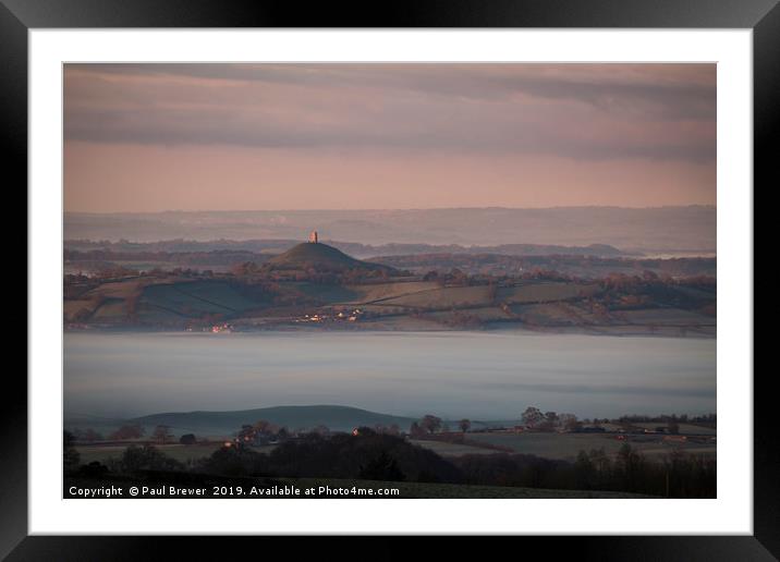 Glastonbury Tor at Sunrise surrounded by mist  Framed Mounted Print by Paul Brewer