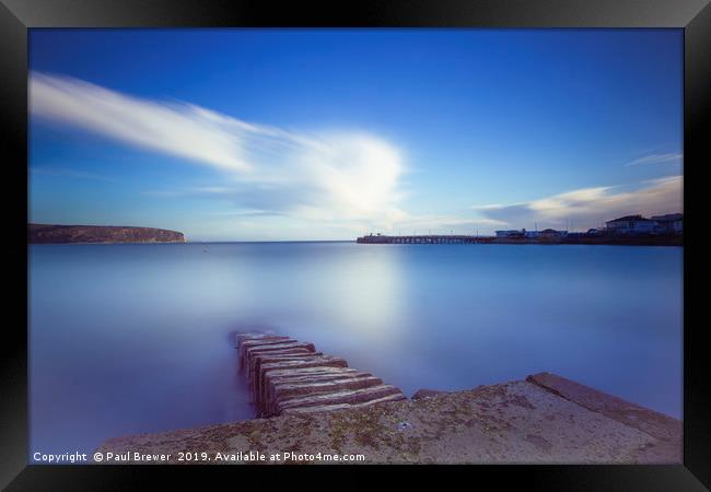 Swanage in Winter Framed Print by Paul Brewer