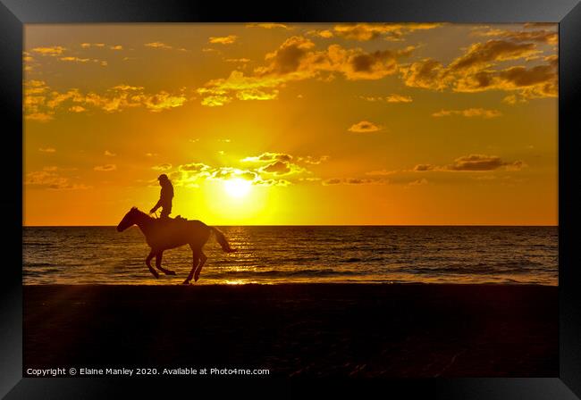 Horseback Riding at Sunset Framed Print by Elaine Manley