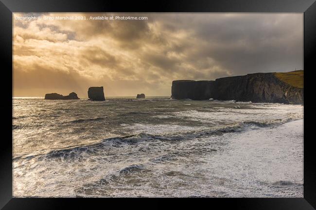 Stormy seas at Dyrhólaey, Iceland Framed Print by Greg Marshall