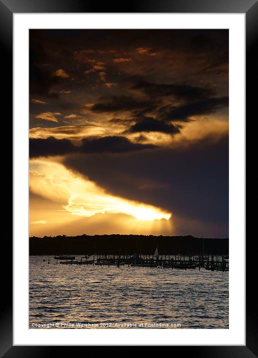 Sun and Cloud over Brownsea Framed Mounted Print by Phil Wareham