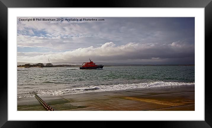 A Lifeboat Returns Framed Mounted Print by Phil Wareham