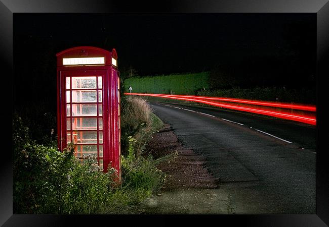 Red Phonebox At Night Framed Print by Malcolm Wood