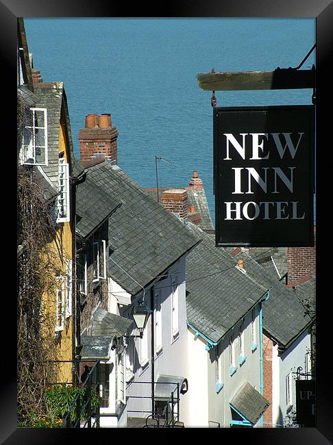 Clovelly cottages Framed Print by Kevin White
