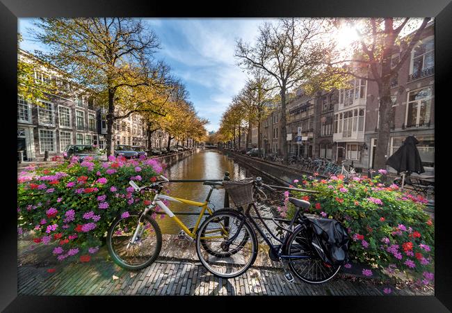 Iconic Amsterdam canal view with bicycle parked be Framed Print by Ankor Light