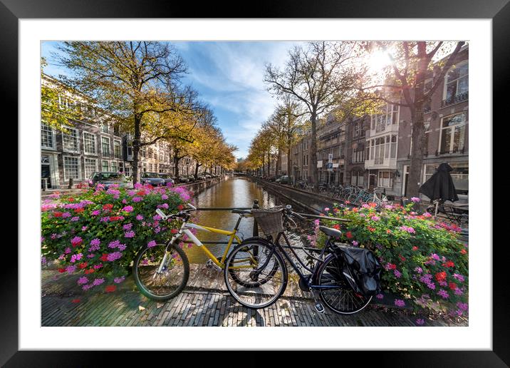 Iconic Amsterdam canal view with bicycle parked be Framed Mounted Print by Ankor Light