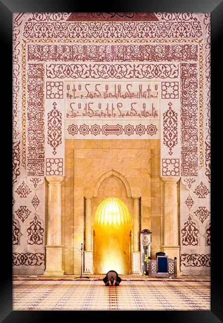 Intimate and abstract prayer alone inside the putrajaya mosque at Putra Jaya city, Kuala Lumpur, Malaysia Framed Print by Ankor Light