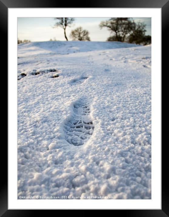 Footstep in the Snow Framed Mounted Print by Buster Brown