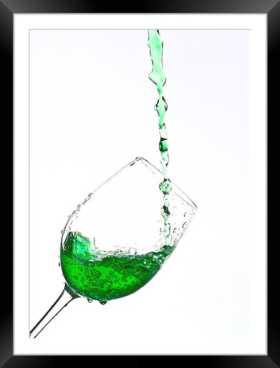 A glass of Green sparkling water Framed Mounted Print by Dave Frost
