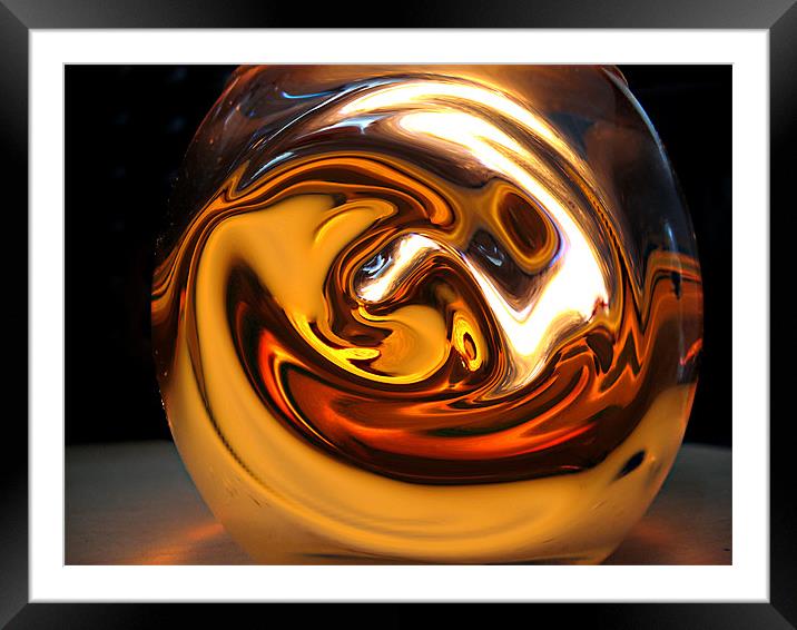 Warm Swirly globe on desk Framed Mounted Print by sean walters