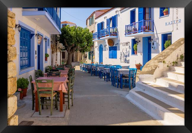 Street Taverna dining tables in Alonissos (Sporade Framed Print by Alan Matkin