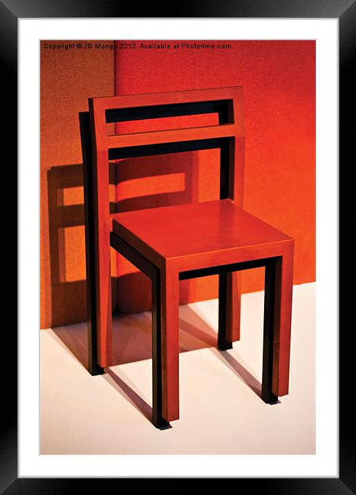 Red Chair on Black Chair Framed Mounted Print by JG Mango