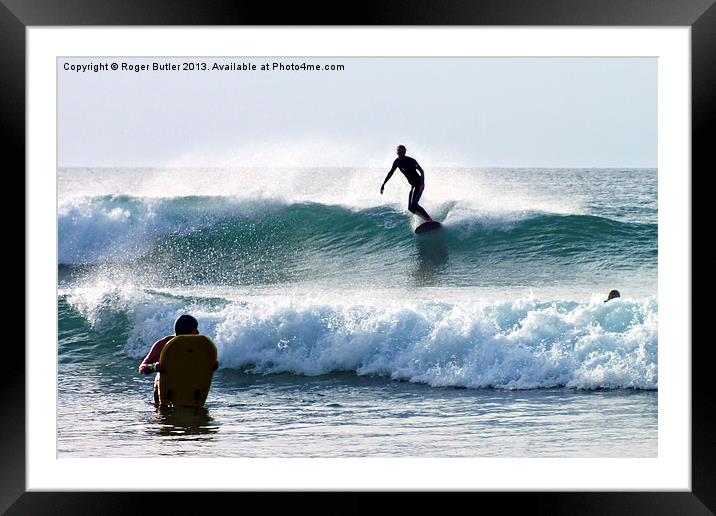 Wave Riders Framed Mounted Print by Roger Butler