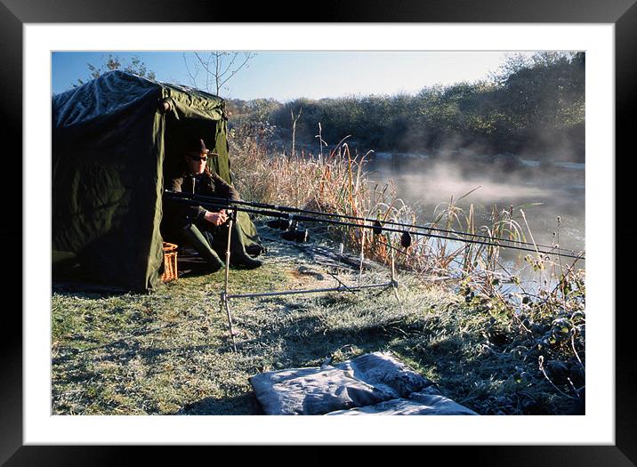 Fishing in winter, mist rising from the surface Framed Mounted Print by Simon Armstrong