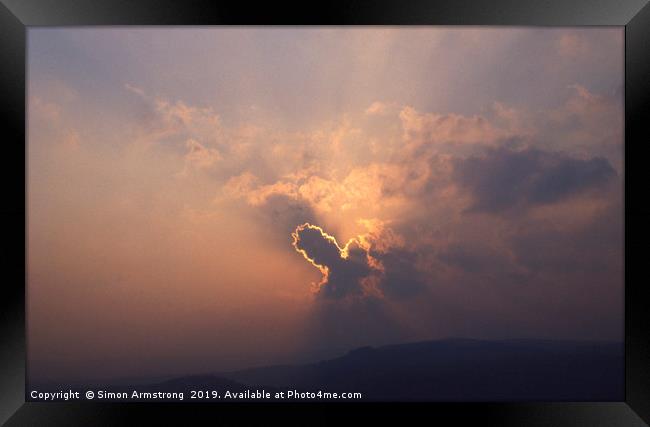 Evening Sunset cloudburst Framed Print by Simon Armstrong