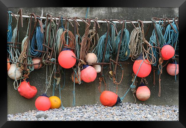 Fishing floats at Sheringham Framed Print by Kathy Simms