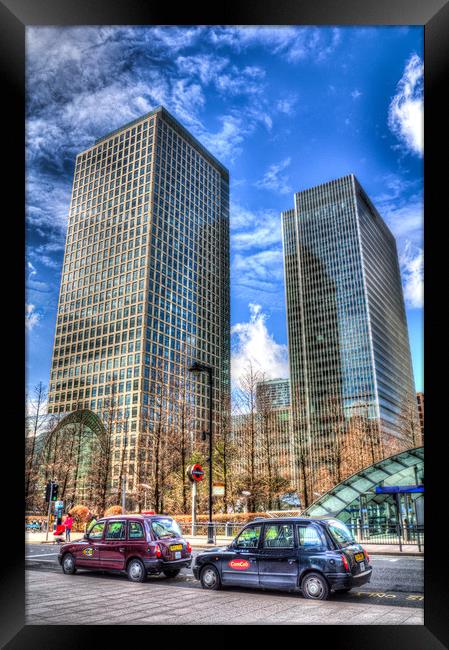 Taxis at Canary Wharf Framed Print by David Pyatt