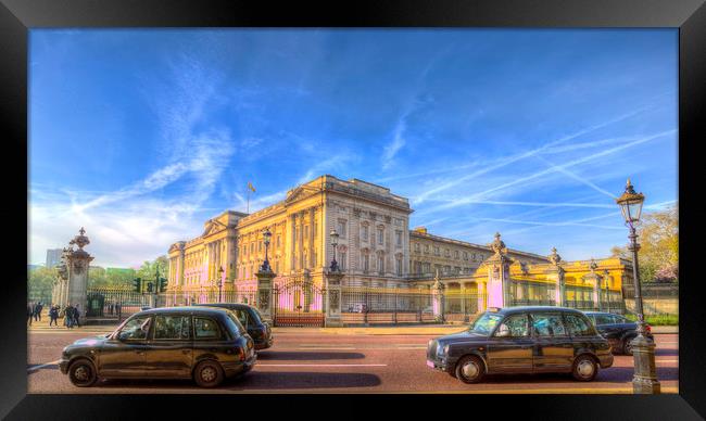 Buckingham Palace And London Taxis Framed Print by David Pyatt