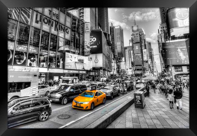 Times Square Yellow Cab Framed Print by David Pyatt