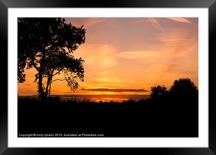 Sunset silhouettes Framed Mounted Print by holly lyndon