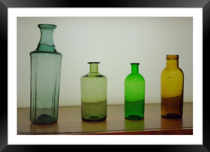 Bottles Framed Mounted Print by Lee Osborne