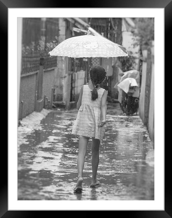 Girl In Rain Framed Mounted Print by Clive Eariss