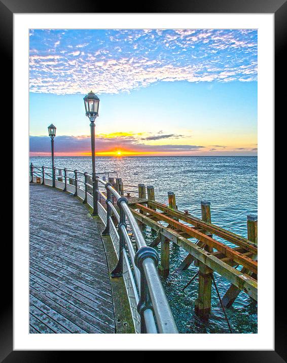 Sunrise Worthing pier Framed Mounted Print by Clive Eariss