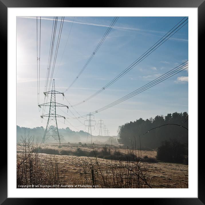 Marching Pylons Framed Mounted Print by Ian Grainger