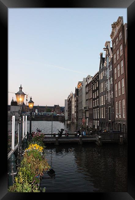Canal in Amsterdam Framed Print by Emma Finbow