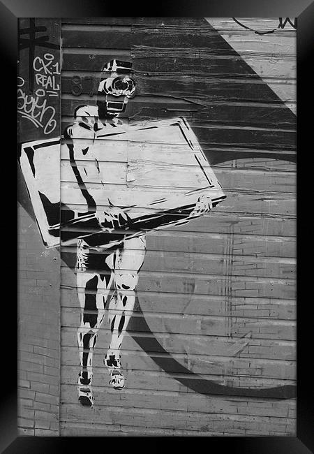 Graffiti Rioter Framed Print by Adrian Wilkins