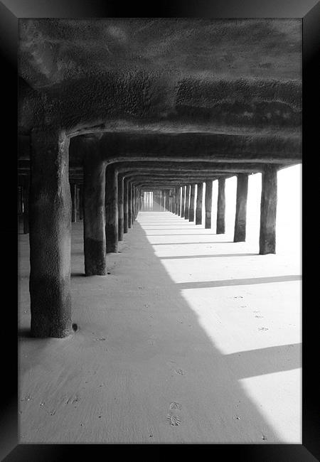 The Beach Below The Pier Framed Print by Adrian Wilkins