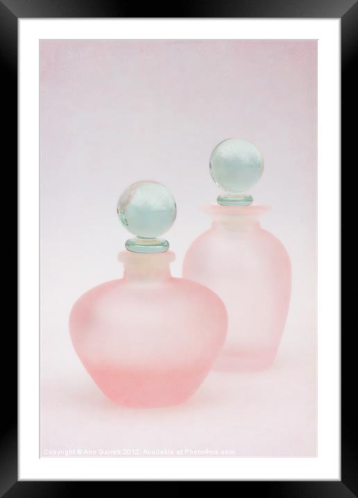Two Pink Frosted Perfume Bottles Framed Mounted Print by Ann Garrett