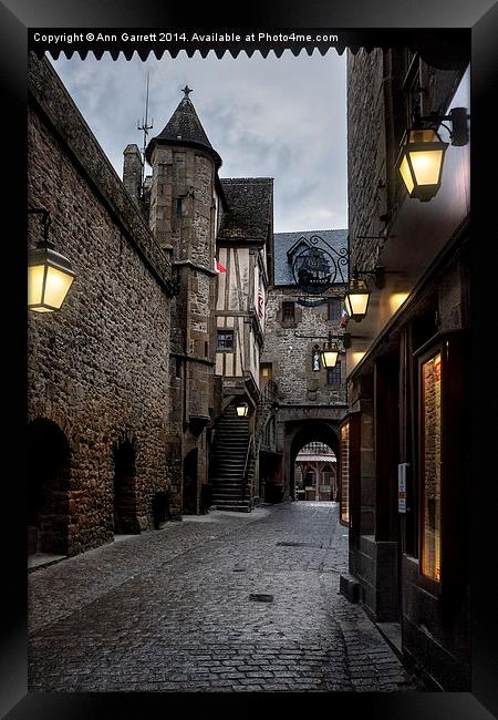 Mont Saint Michel Street at Night Framed Print by Ann Garrett