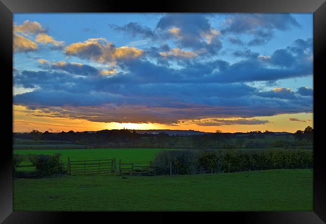 SUNSET Framed Print by David Atkinson