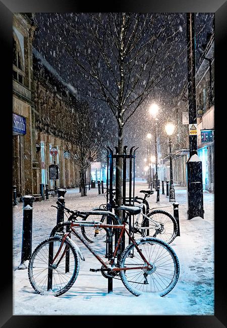  Cycles in the Snow, Cambridge Street, Harrogate Framed Print by Paul M Baxter