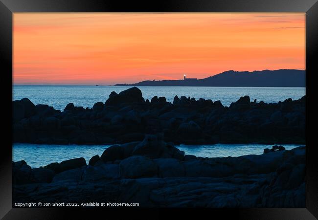 Lighthouse of the Setting Sun Framed Print by Jon Short